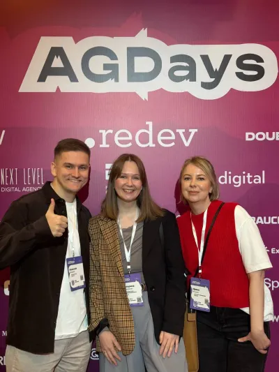 Участники у баннера AGDays